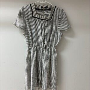 B&W vintage polka dot dress, elastic waist and front pleating w/black buttons